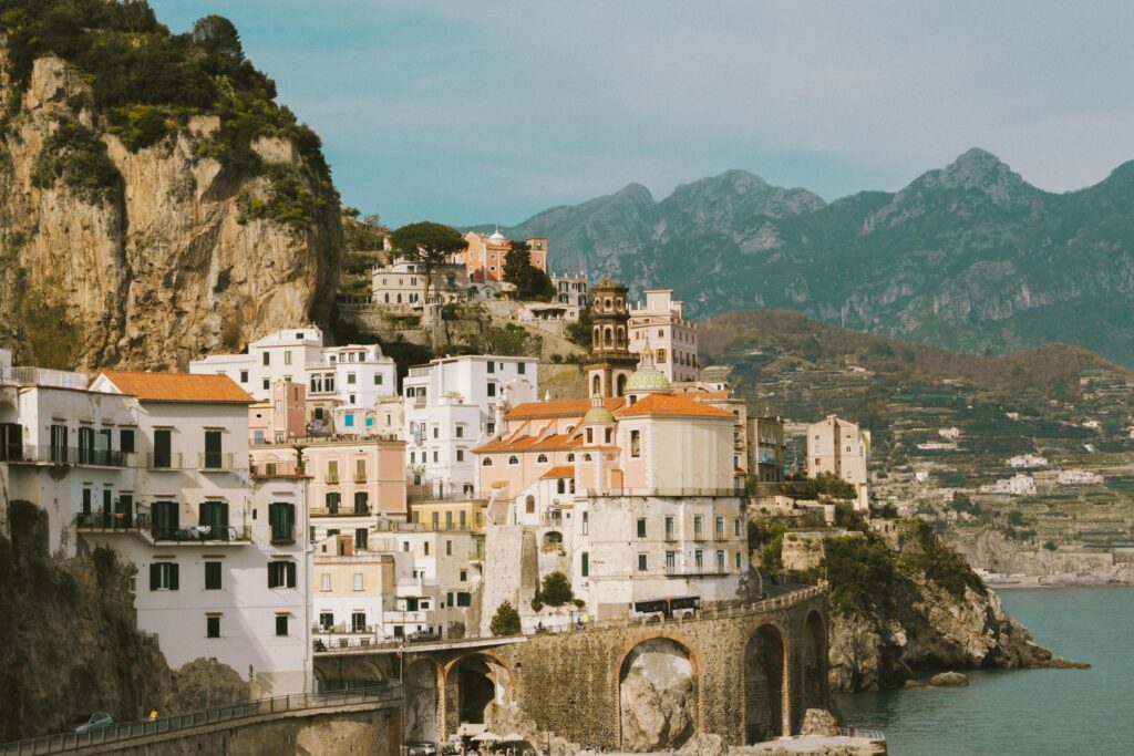 Scenic landscape of Amalfi Coast with colorful cliffside houses.
